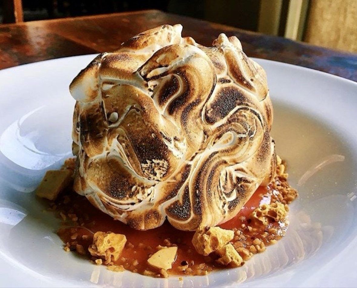 Baked Alaska with caramel sauce